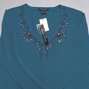 Reference Point carnagan sweater.